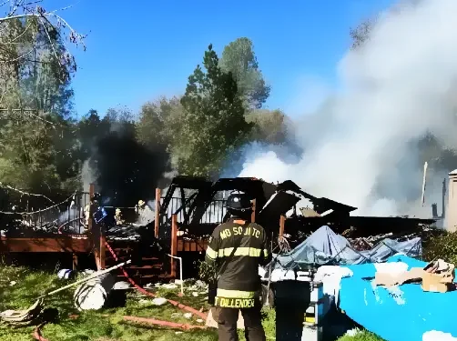 Two-Story Home Destroyed in Morning Fire on Gravel Road; Crews Continue Overhaul