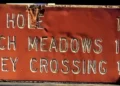 Vintage Sierra Sign Linked to Hell Hole and French Meadows Surfaces in El Dorado County Find